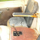 Illustration for article titled You Know The Economy Is Bad When 'Bring A Trailer' Is Offering This Rusty Shitbox Mitsubishi Three-Wheeler